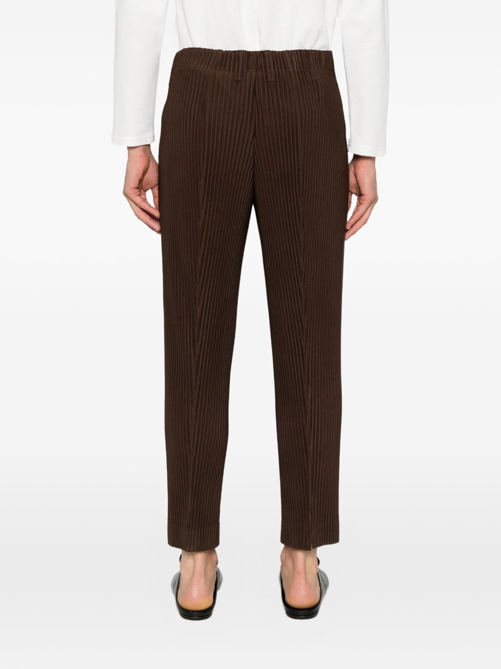 Pleated slit-hem trousers HP68JF153 46 HOMME PLISSÉ ISSEY MIYAKE