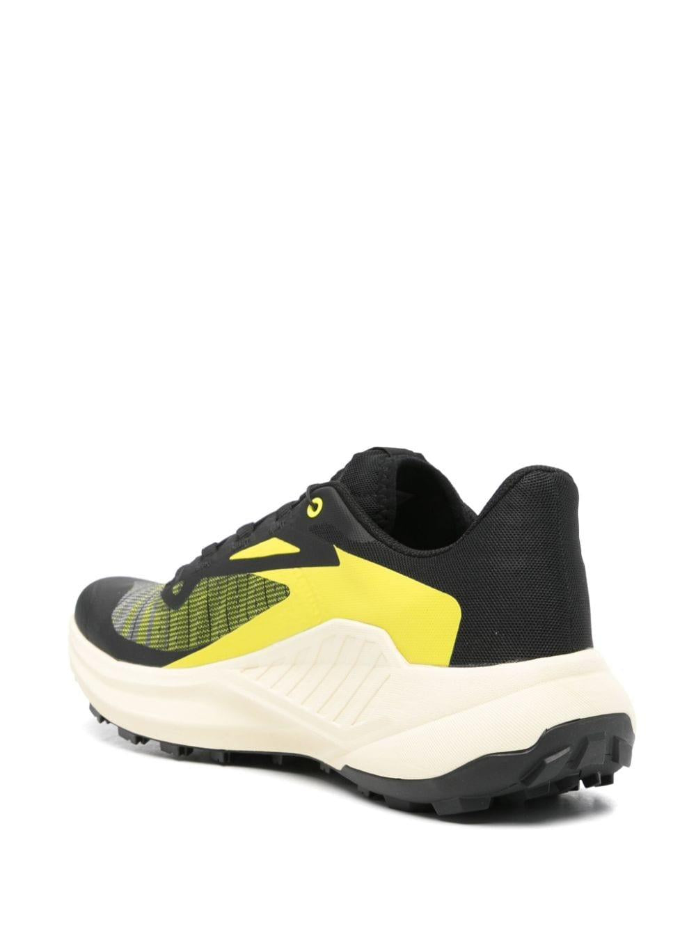 Genesis logo-print sneakers<BR/><BR/> L47443100 S BLACK/SULPHUR SPRING/TYELLO SALOMON