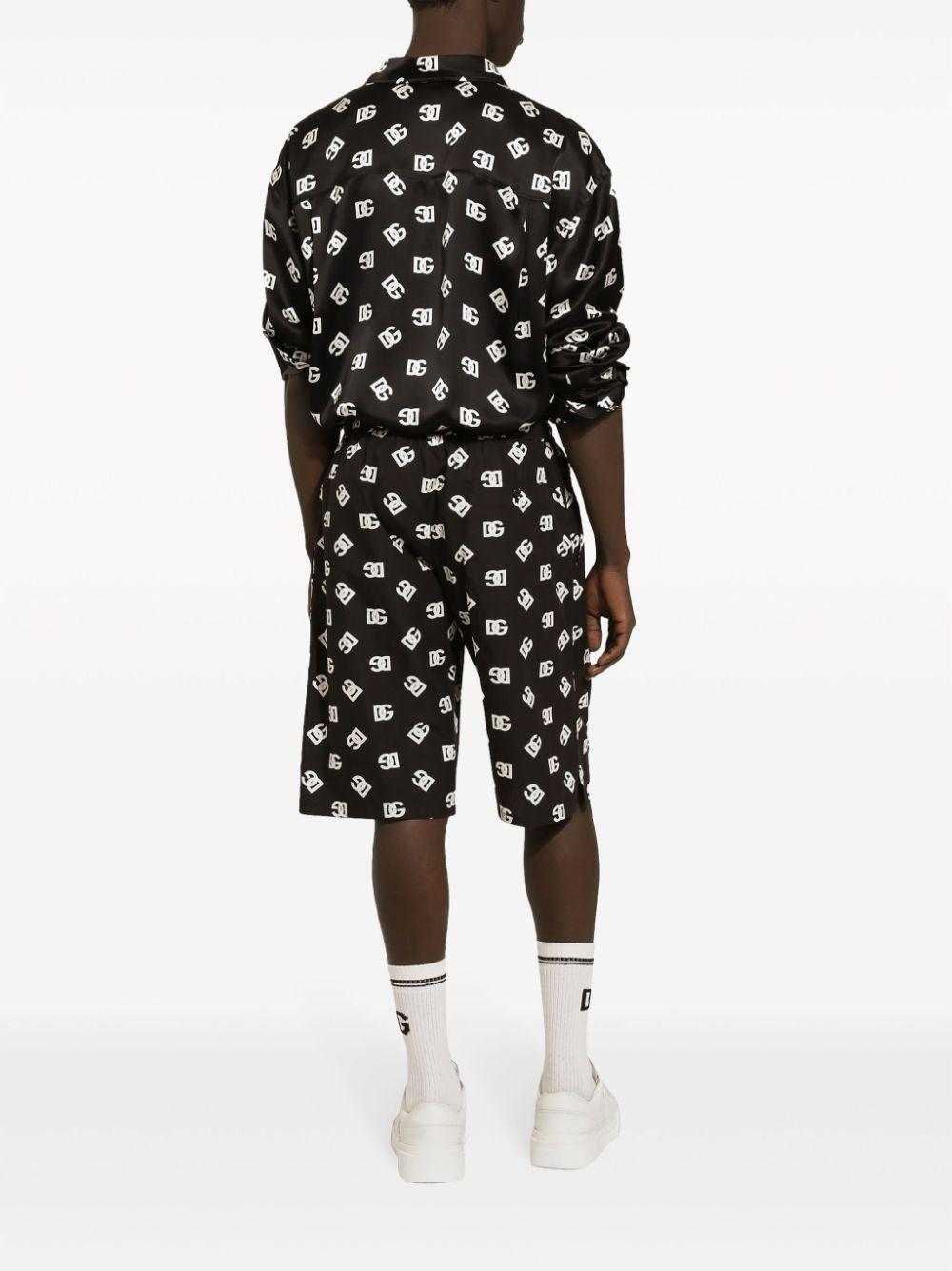 Monogram-print bermuda shorts<BR/><BR/><BR/> GV37AT GH563HNVAA DOLCE & GABBANA