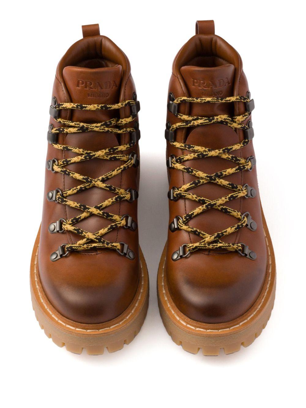 Laced leather ankle boots<BR/><BR/><BR/> 1T735N 070F0046 PRADA