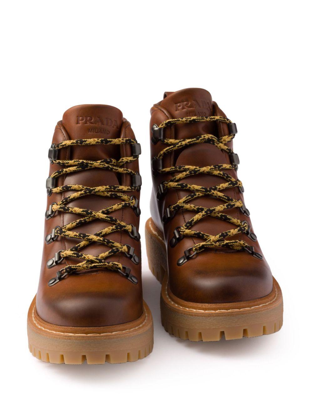 Laced leather ankle boots<BR/><BR/><BR/> 1T735N 070F0046 PRADA