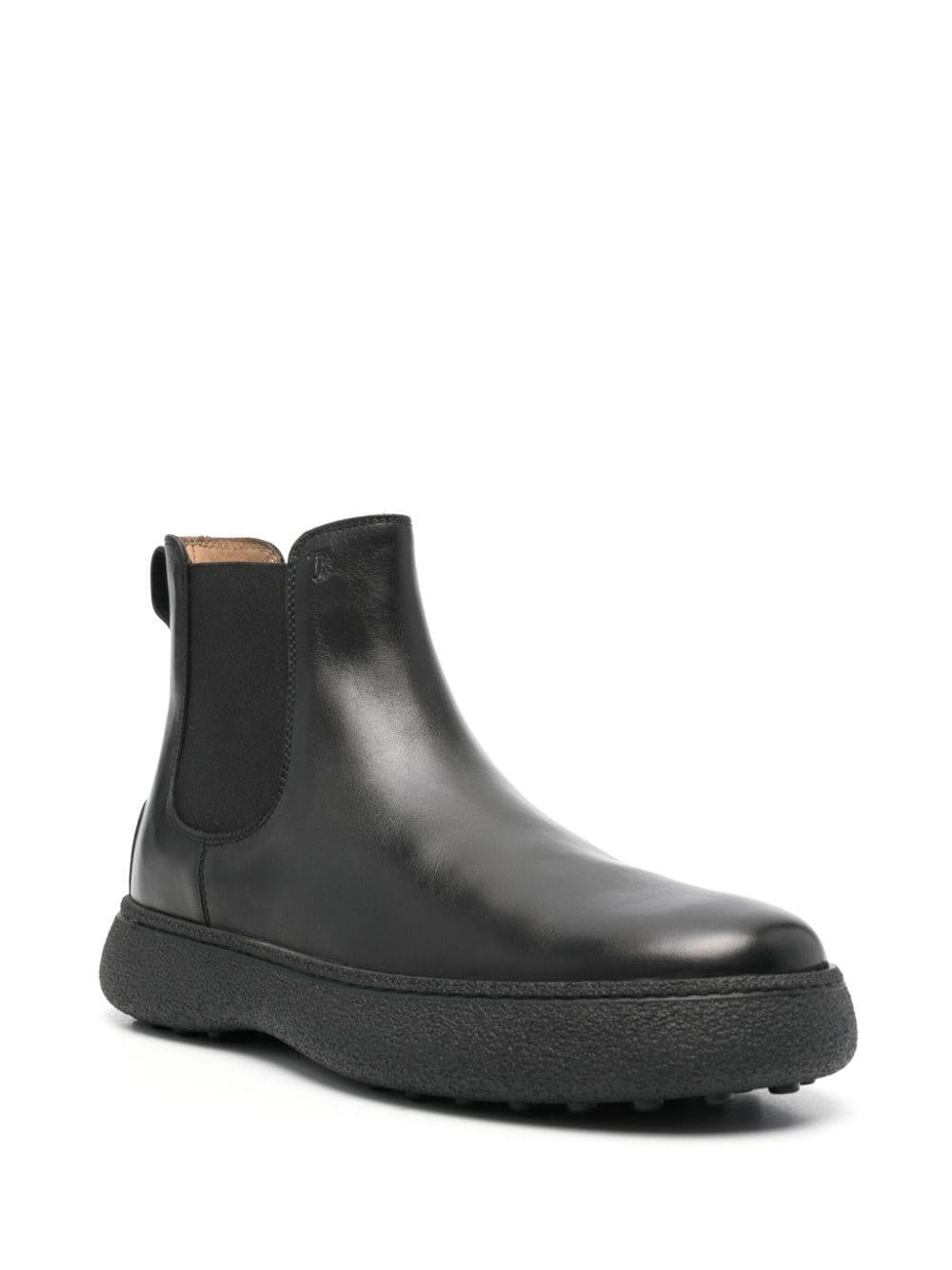 Logo-debossed leather boots<BR/><BR/><BR/> XXM06L00P20D90 B999 TOD'S
