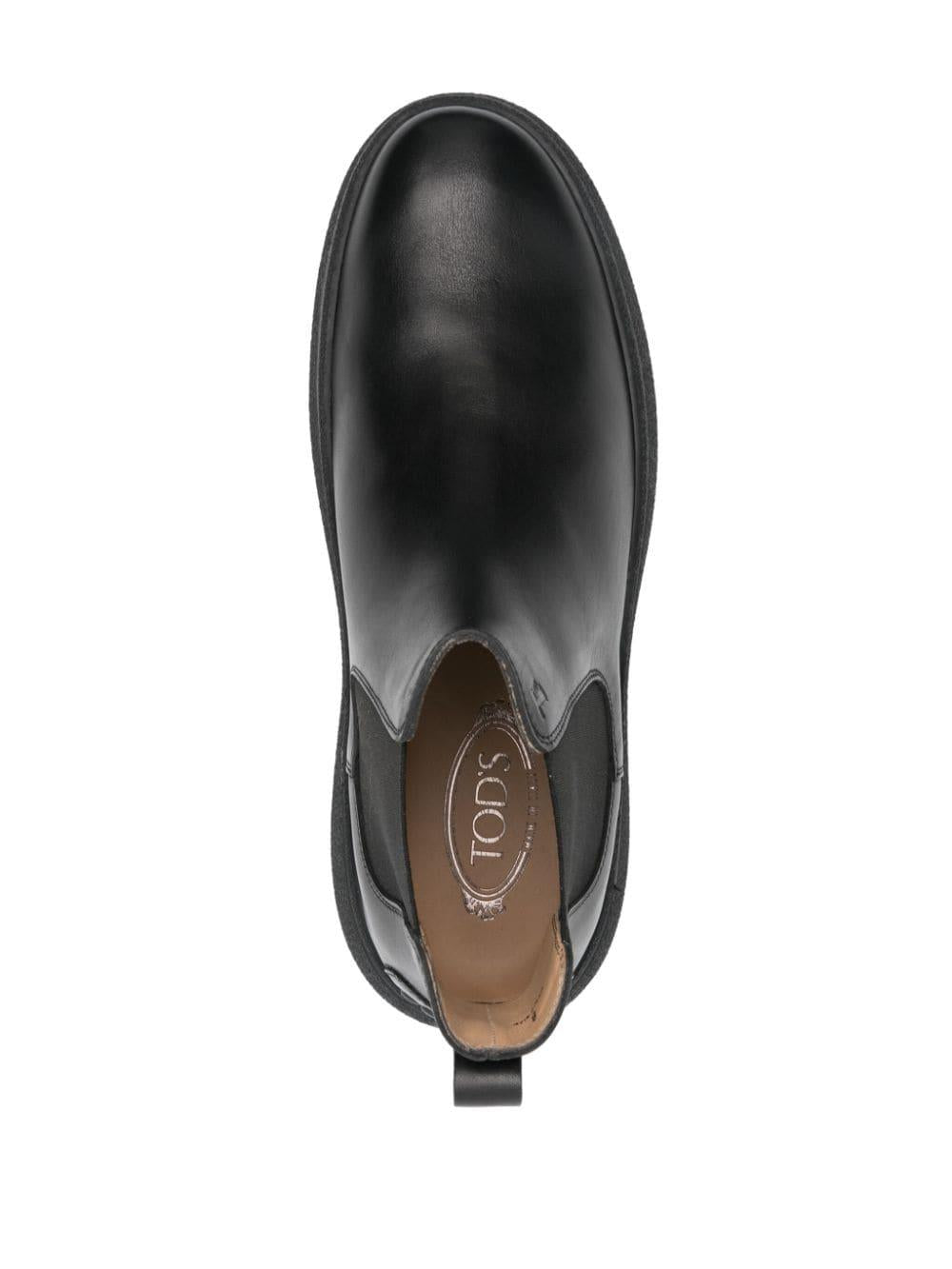 Logo-debossed leather boots<BR/><BR/><BR/> XXM06L00P20D90 B999 TOD'S