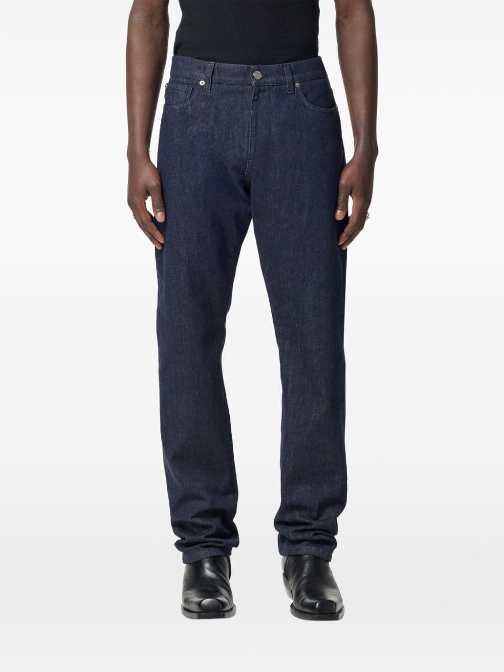 Logo-patch jeans<BR/><BR/><BR/> 1015844 1A124771D100 VERSACE