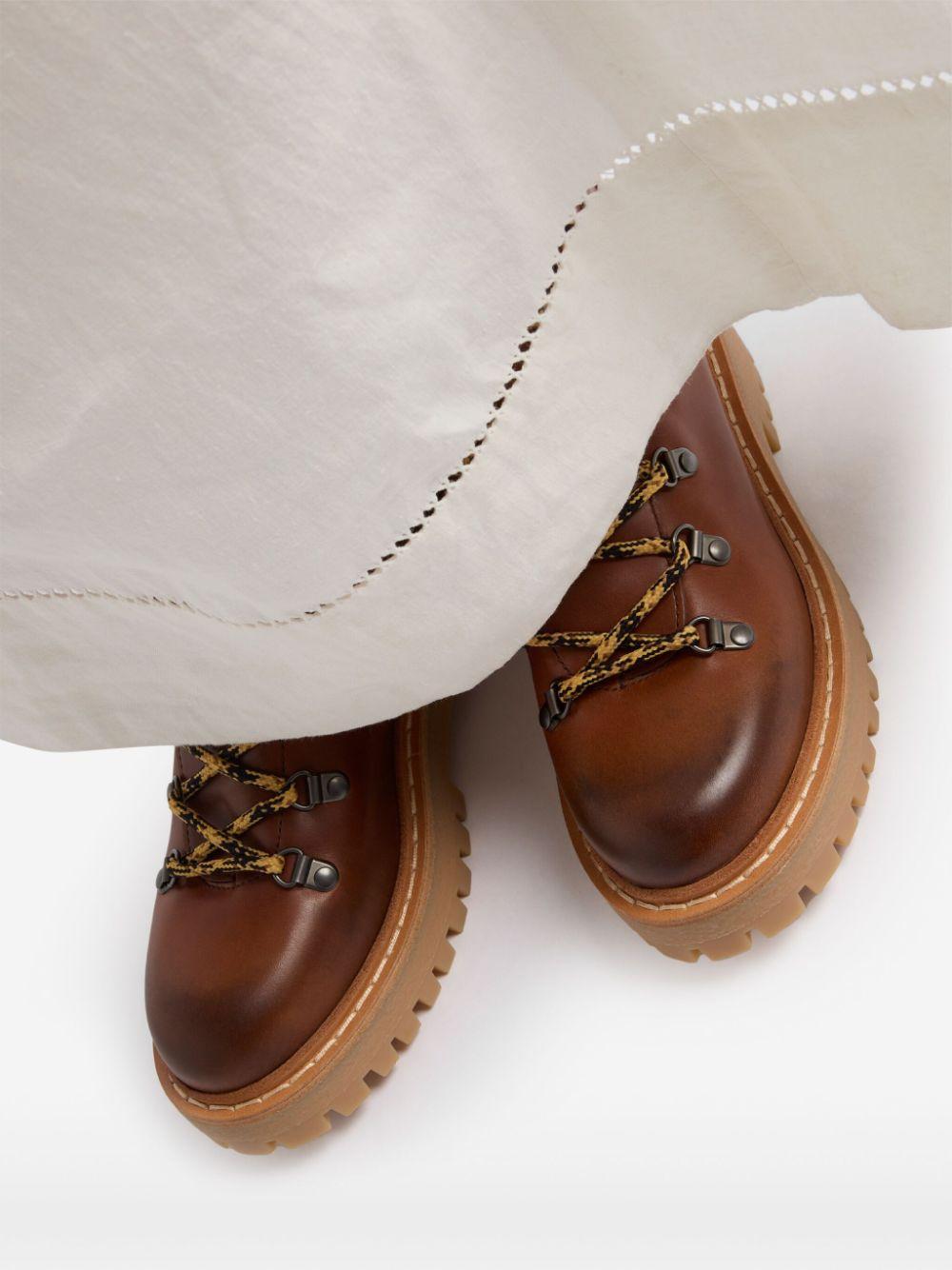 Laced leather ankle boots<BR/><BR/><BR/> 1T735N 070F0046 PRADA