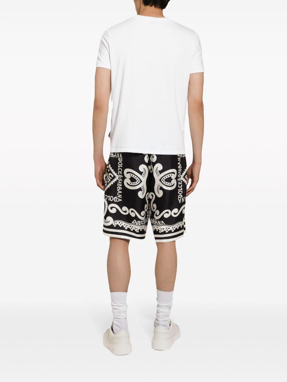 Silk all-over logo print shorts GV37AT HI1QDHB4XR DOLCE & GABBANA
