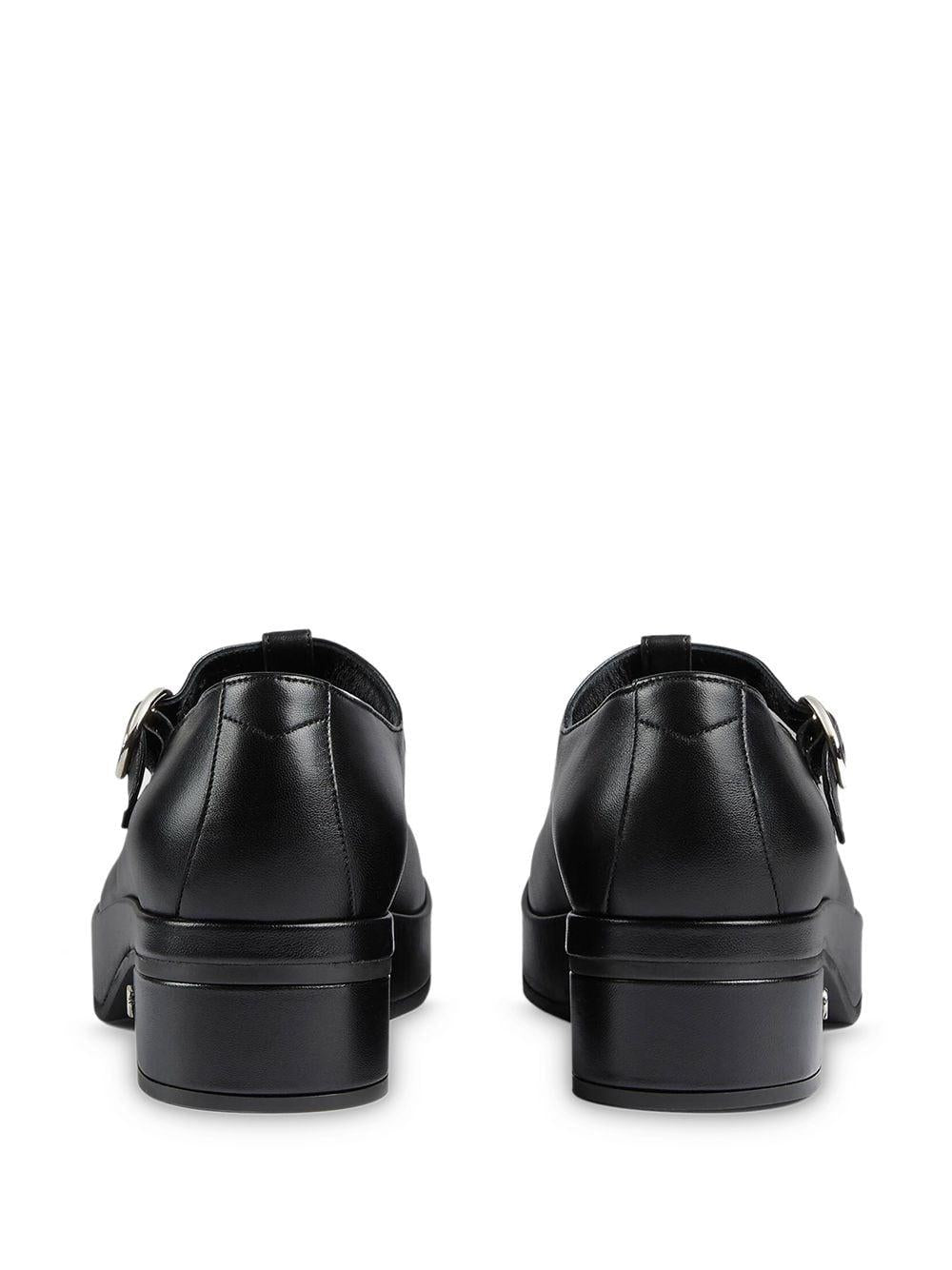 Mary Janes in pelle colore nero con tacco scultura 635673 BKO001000 GUCCI