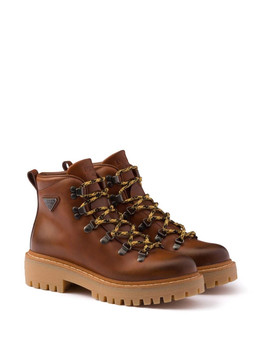 Laced leather ankle boots<BR/><BR/><BR/> 1T735N 070F0046 PRADA