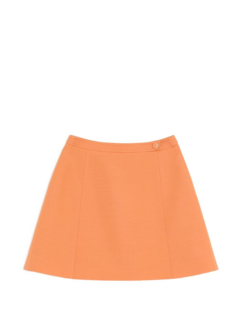 Crepe Couture skirt with heart-shaped jewel buttons 9B3RAFB01CF 136 VALENTINO GARAVANI
