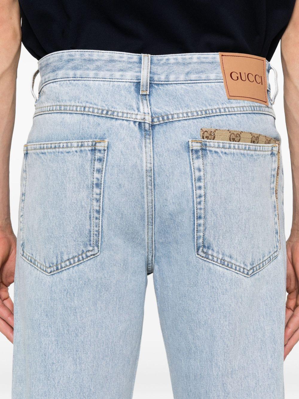 Washed denim pant with GG insert 835219 XDDCY4452 GUCCI
