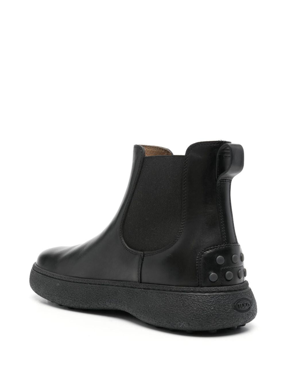 Logo-debossed leather boots<BR/><BR/><BR/> XXM06L00P20D90 B999 TOD'S