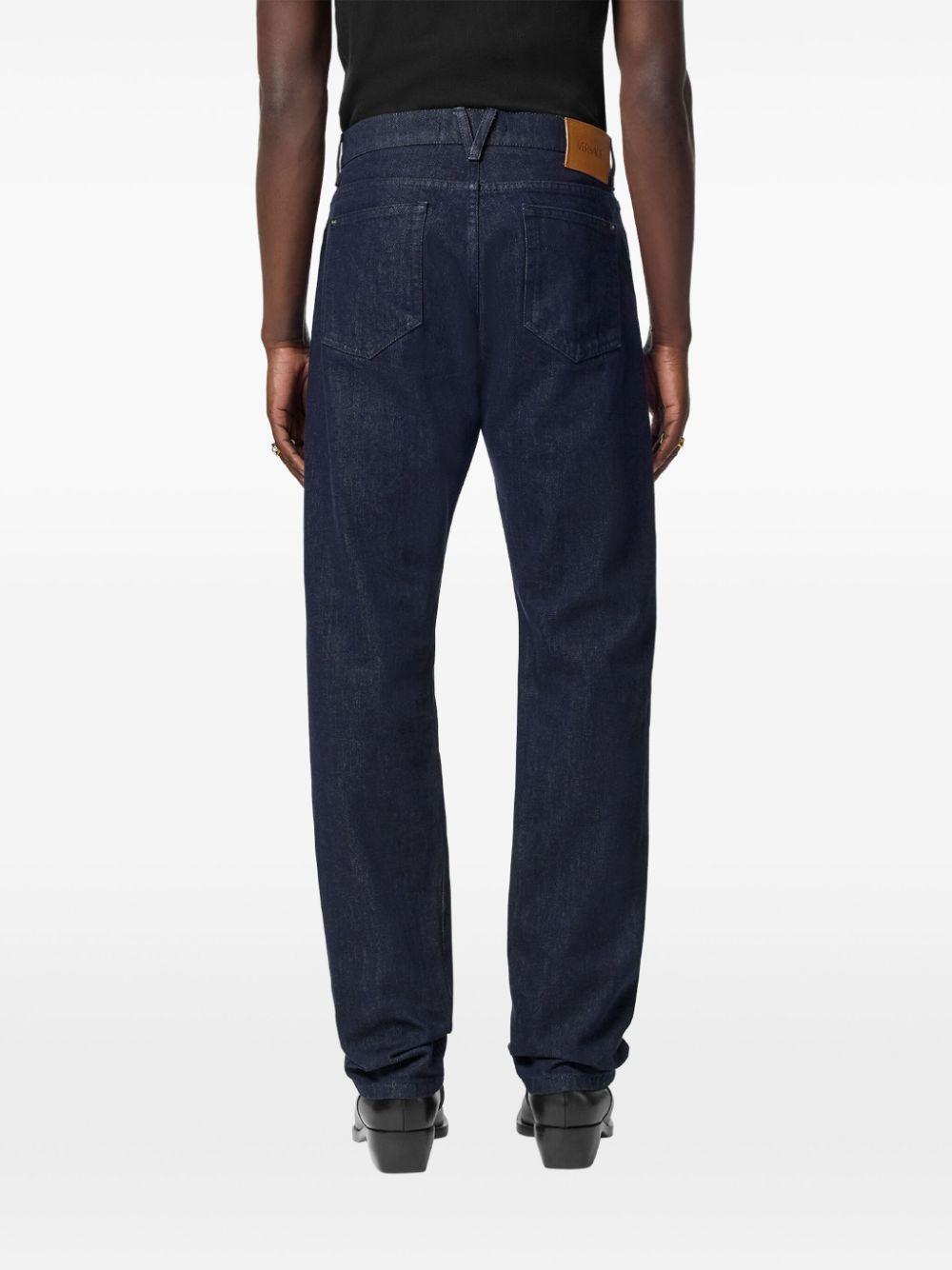 Logo-patch jeans<BR/><BR/><BR/> 1015844 1A124771D100 VERSACE