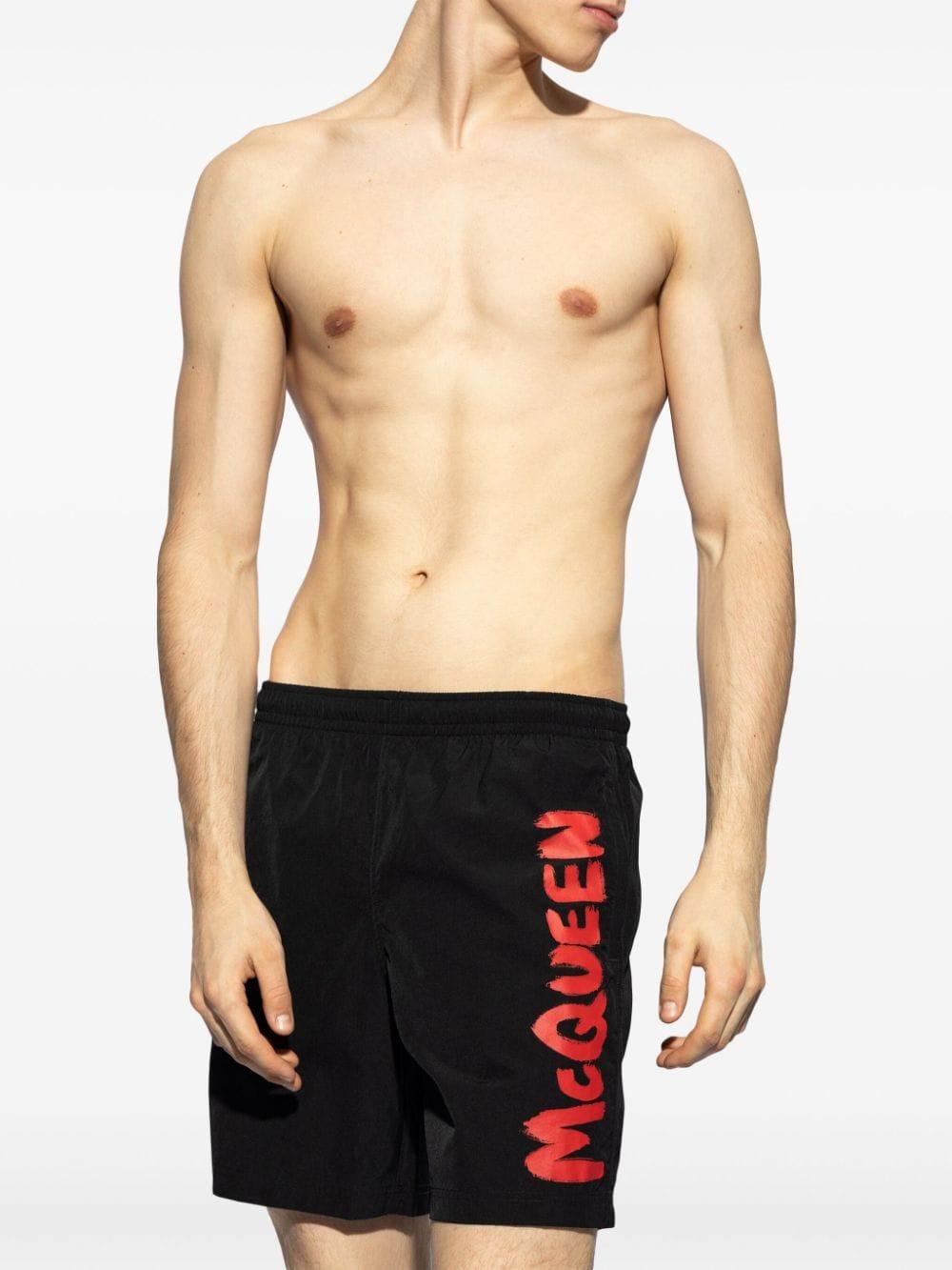 Logo-print swim shorts 660060 4419Q1074 ALEXANDER MCQUEEN