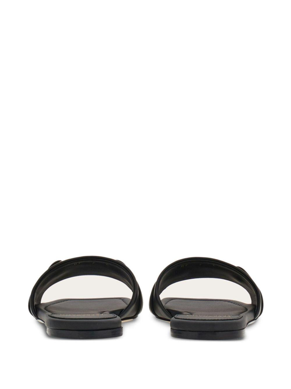 Gancini-plaque leather slides<BR/><BR/><BR/> LEAH 769636NERO FERRAGAMO