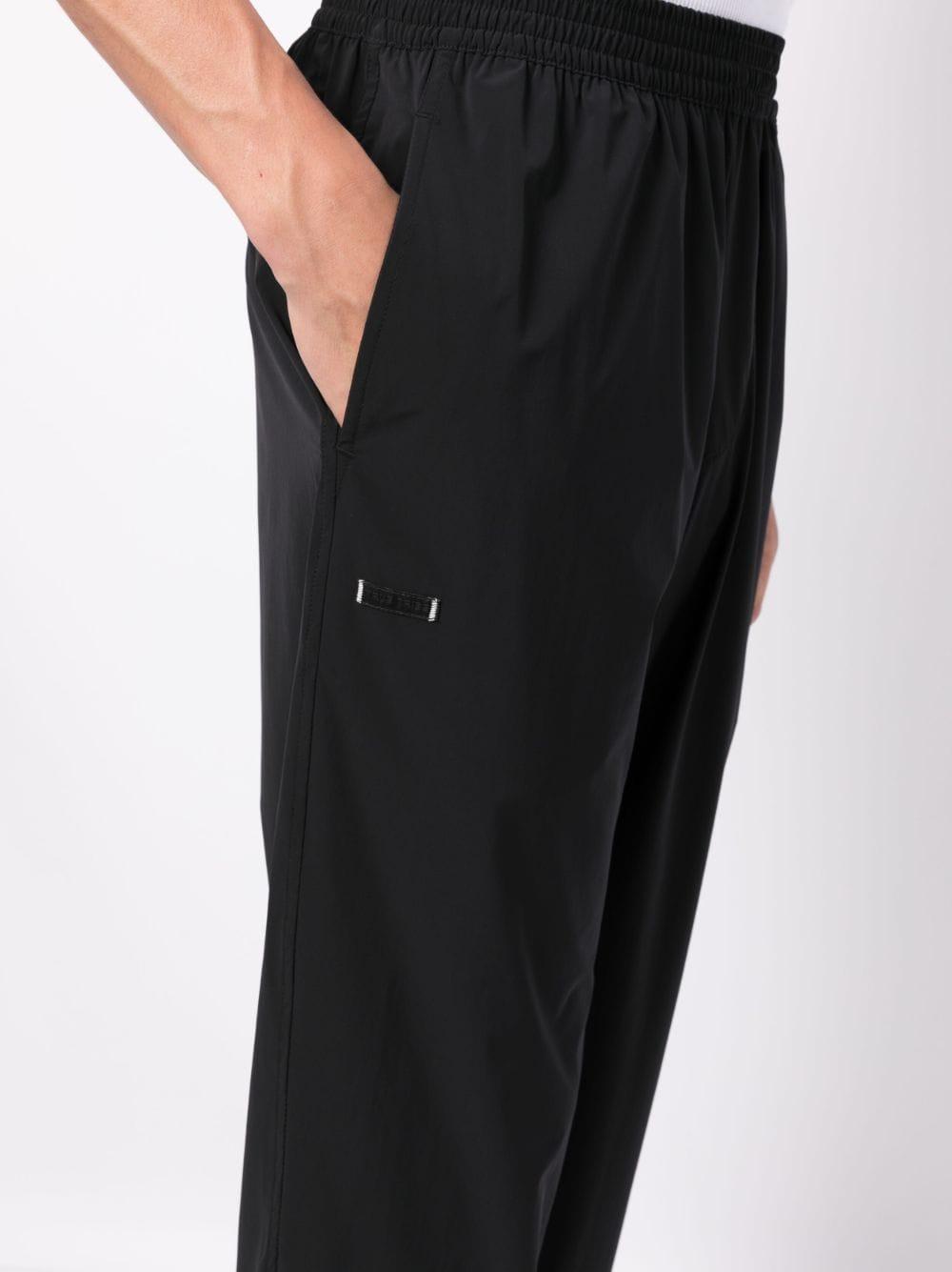 Logo-patch elasticated-waist trousers FIT STEVE COSMIC BLACK TRUE TRIBE