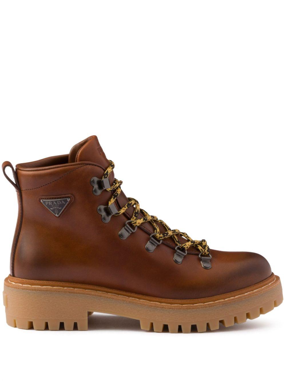 Laced leather ankle boots<BR/><BR/><BR/> 1T735N 070F0046 PRADA