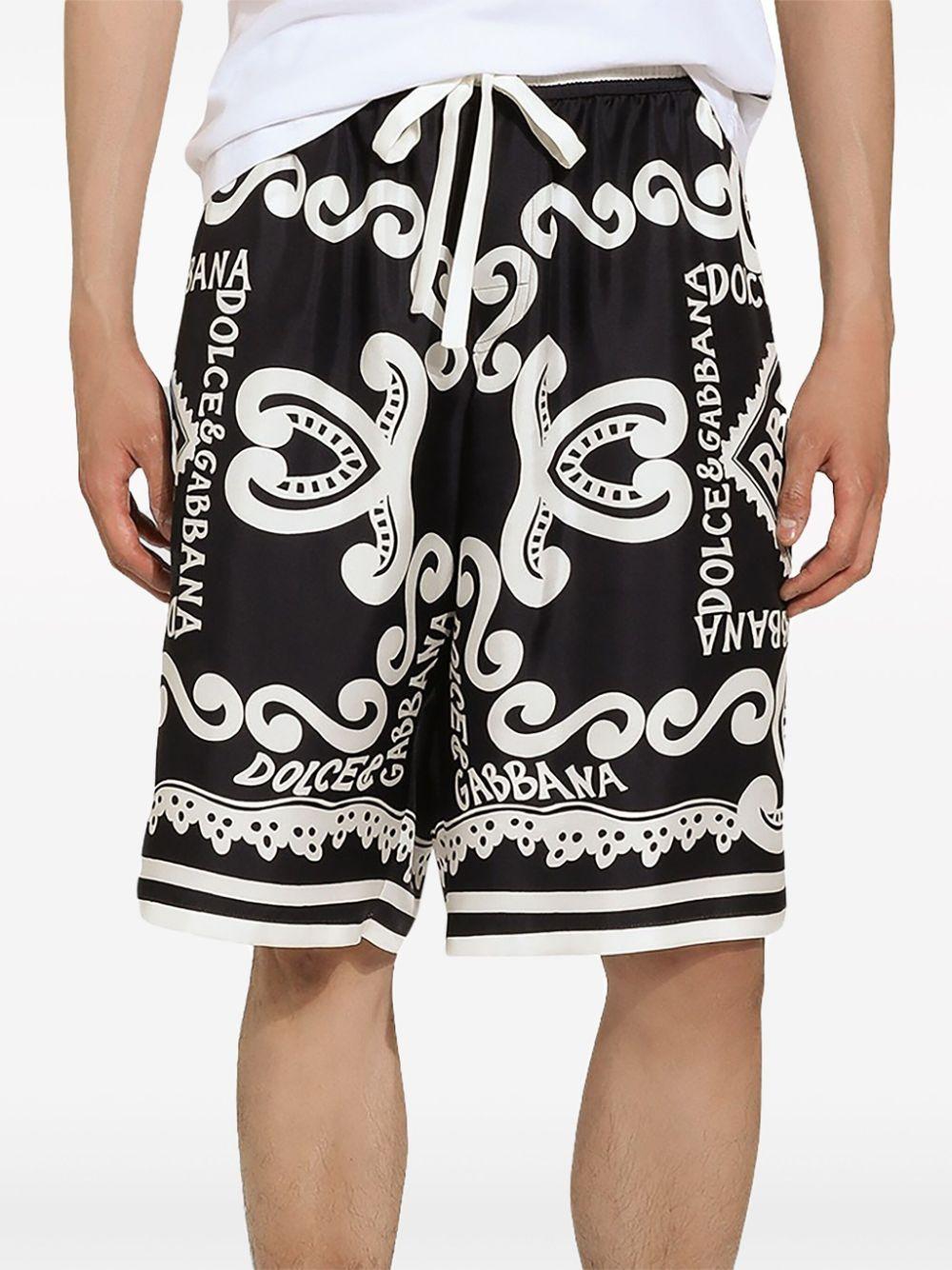 Silk all-over logo print shorts GV37AT HI1QDHB4XR DOLCE & GABBANA