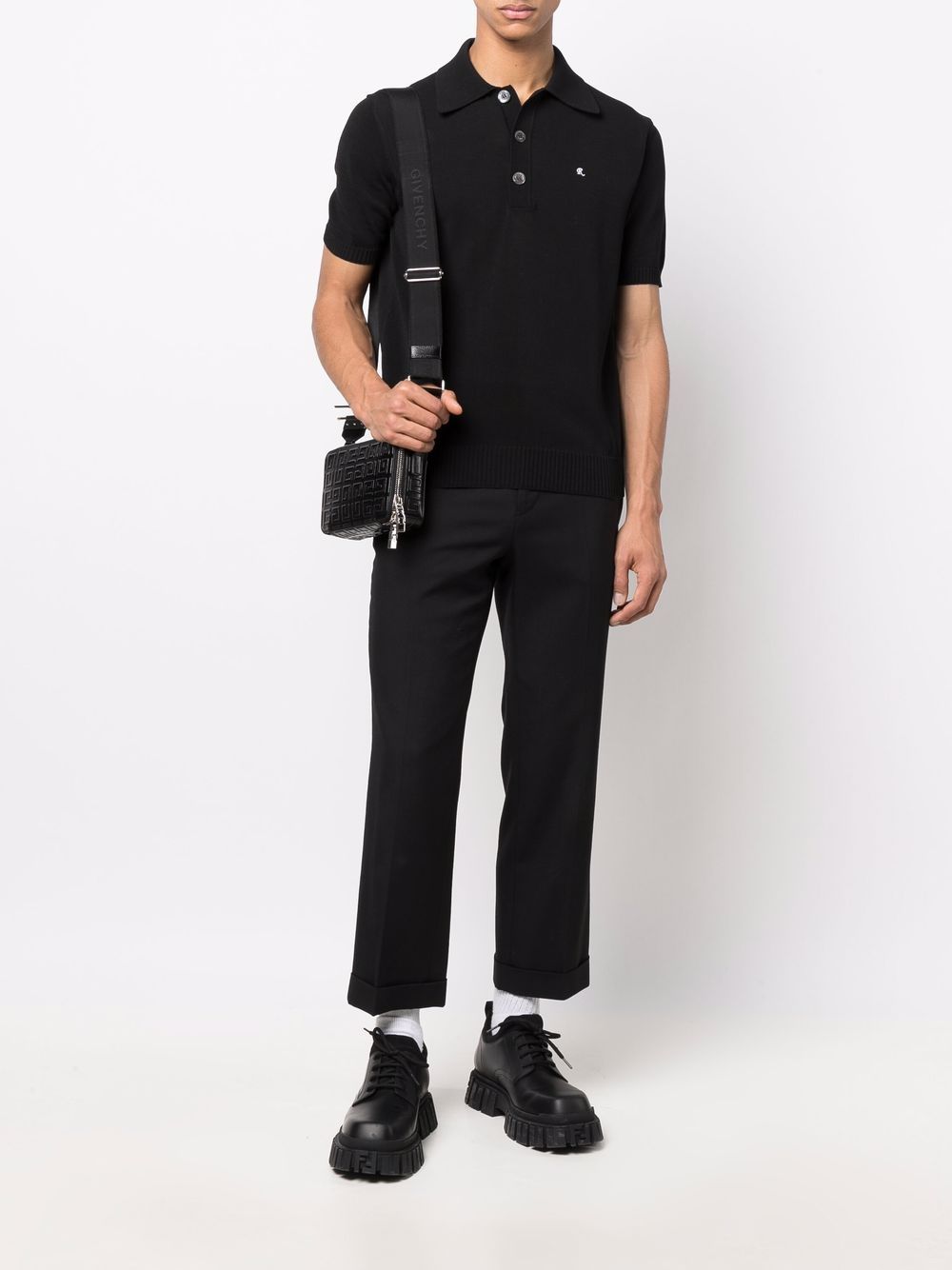 Polo nera in maglia di cotone cotone