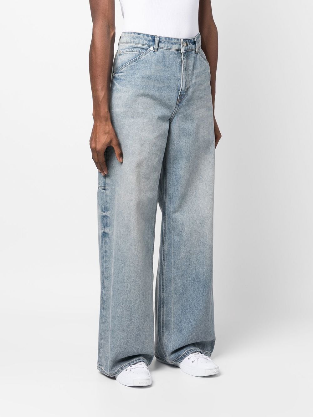 Jeans in denim con tasche applicate