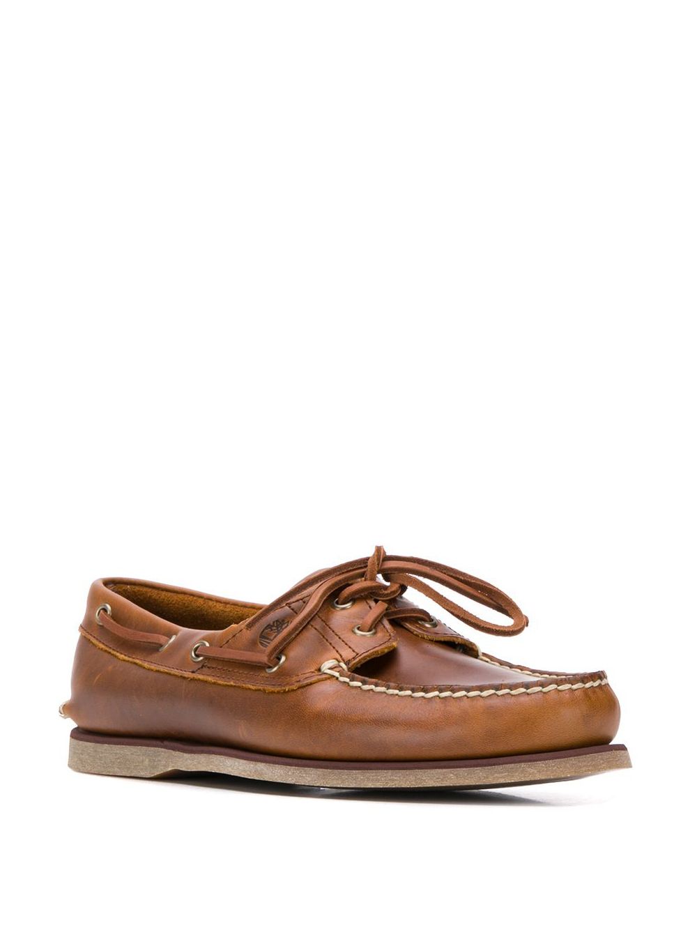 Brown leather lace-up boat shoes