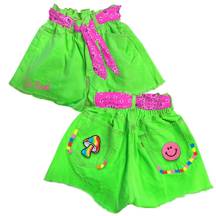 Neon green/pink shorts with patches on the pockets