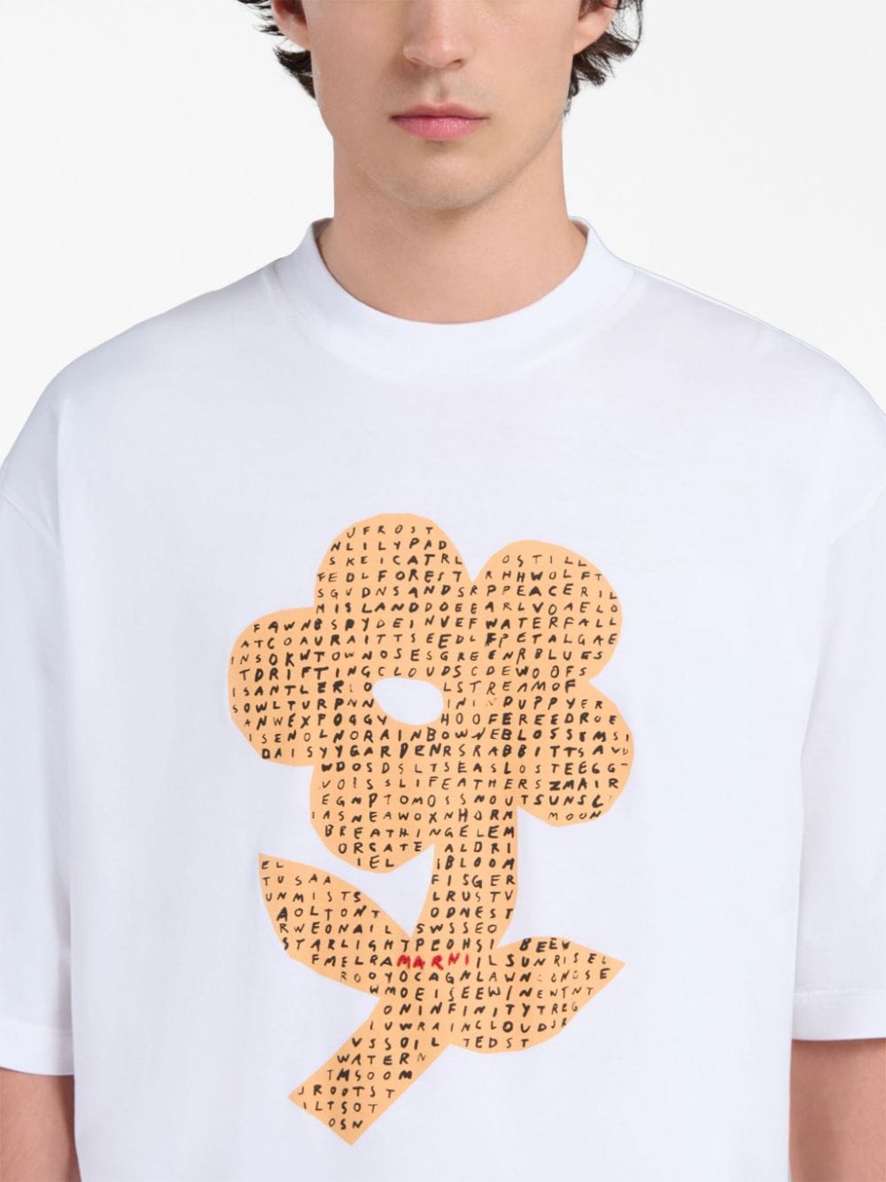 T-shirt in cotone con stampa floreale<br><br><br>