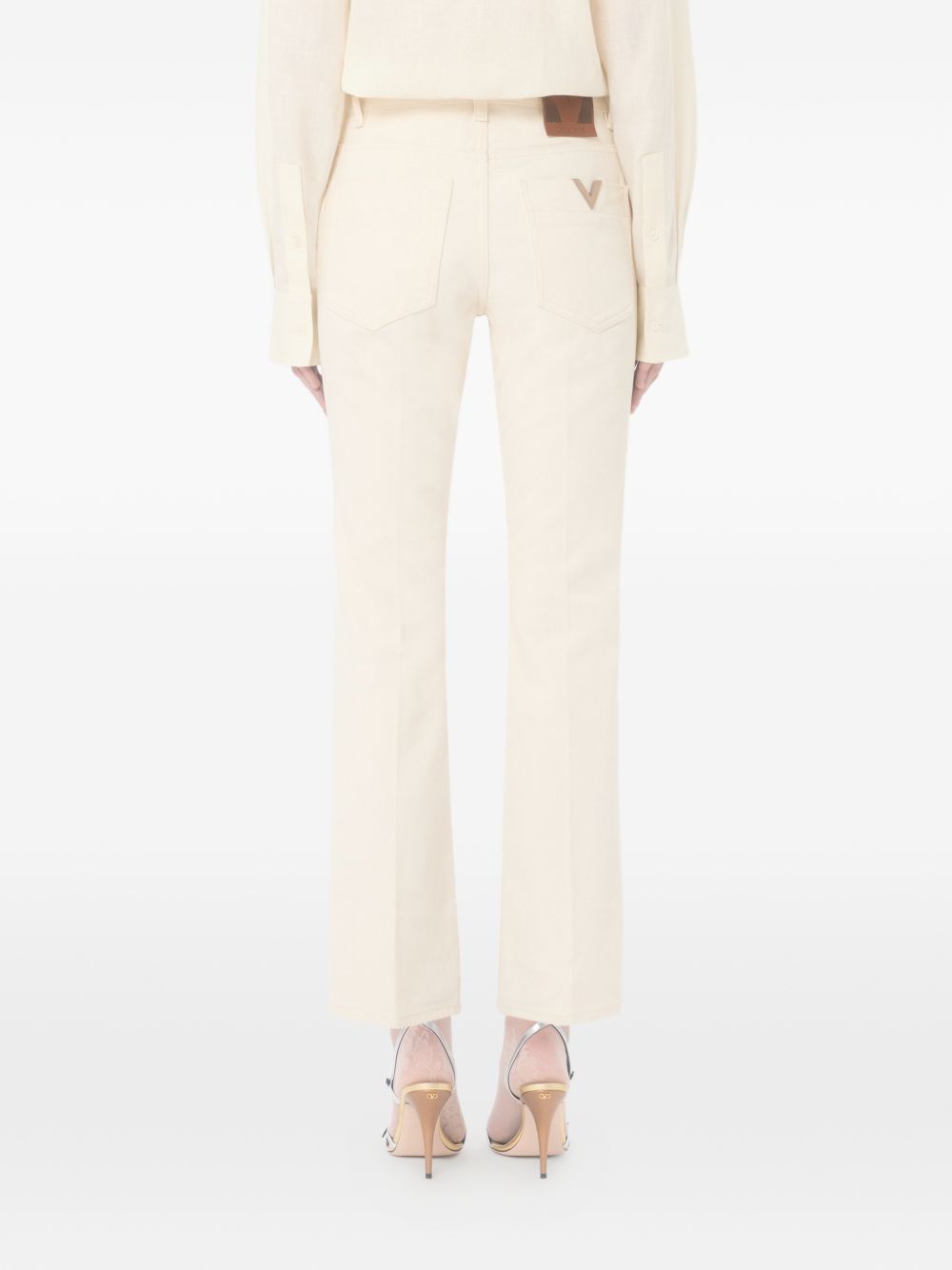 Flared denim jeans with gold V detail 8B3DD21V9Y5 A03 VALENTINO GARAVANI 