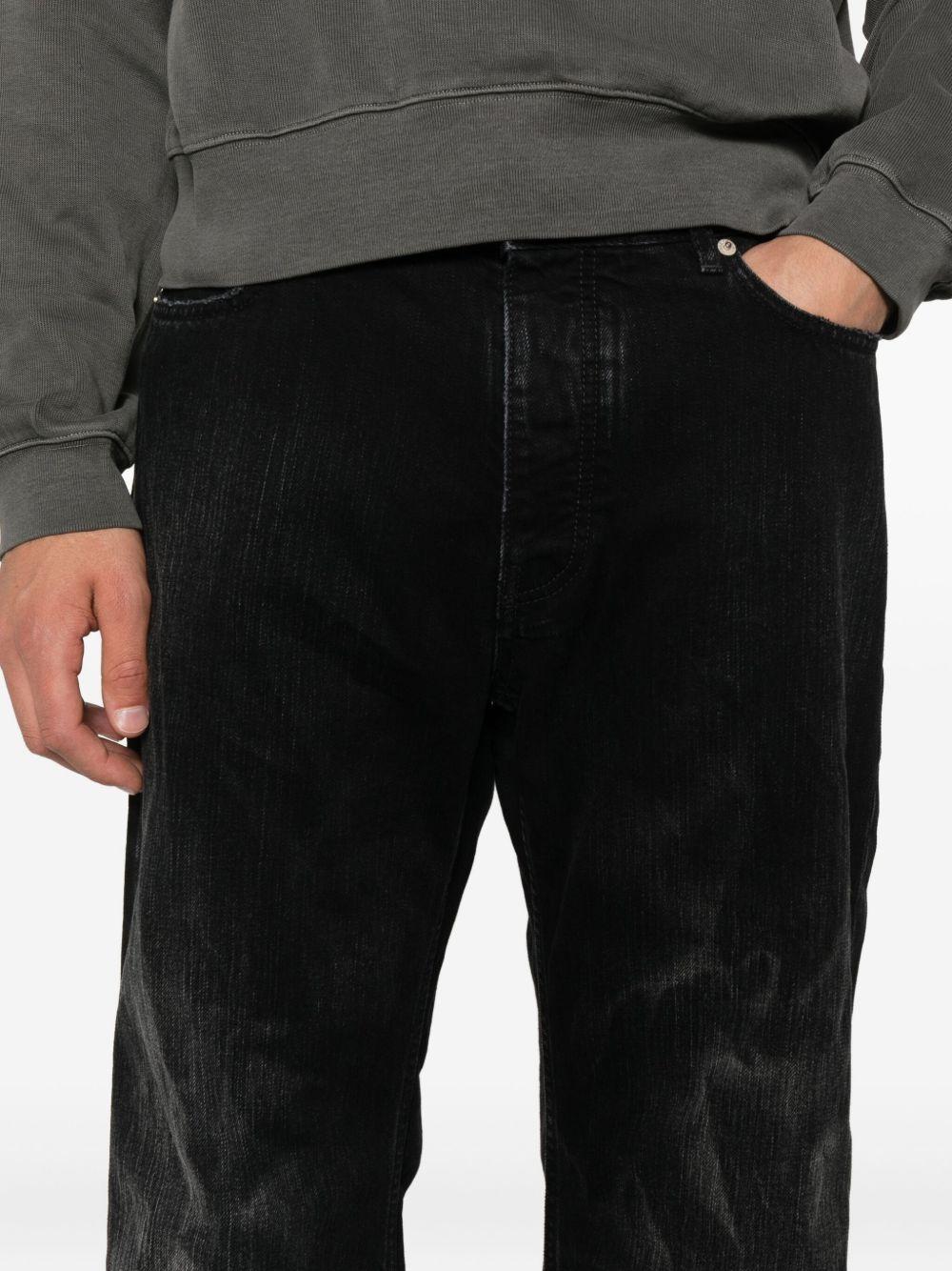 Distressed jeans in cotton denim 851352 TTW671037 BALENCIAGA 