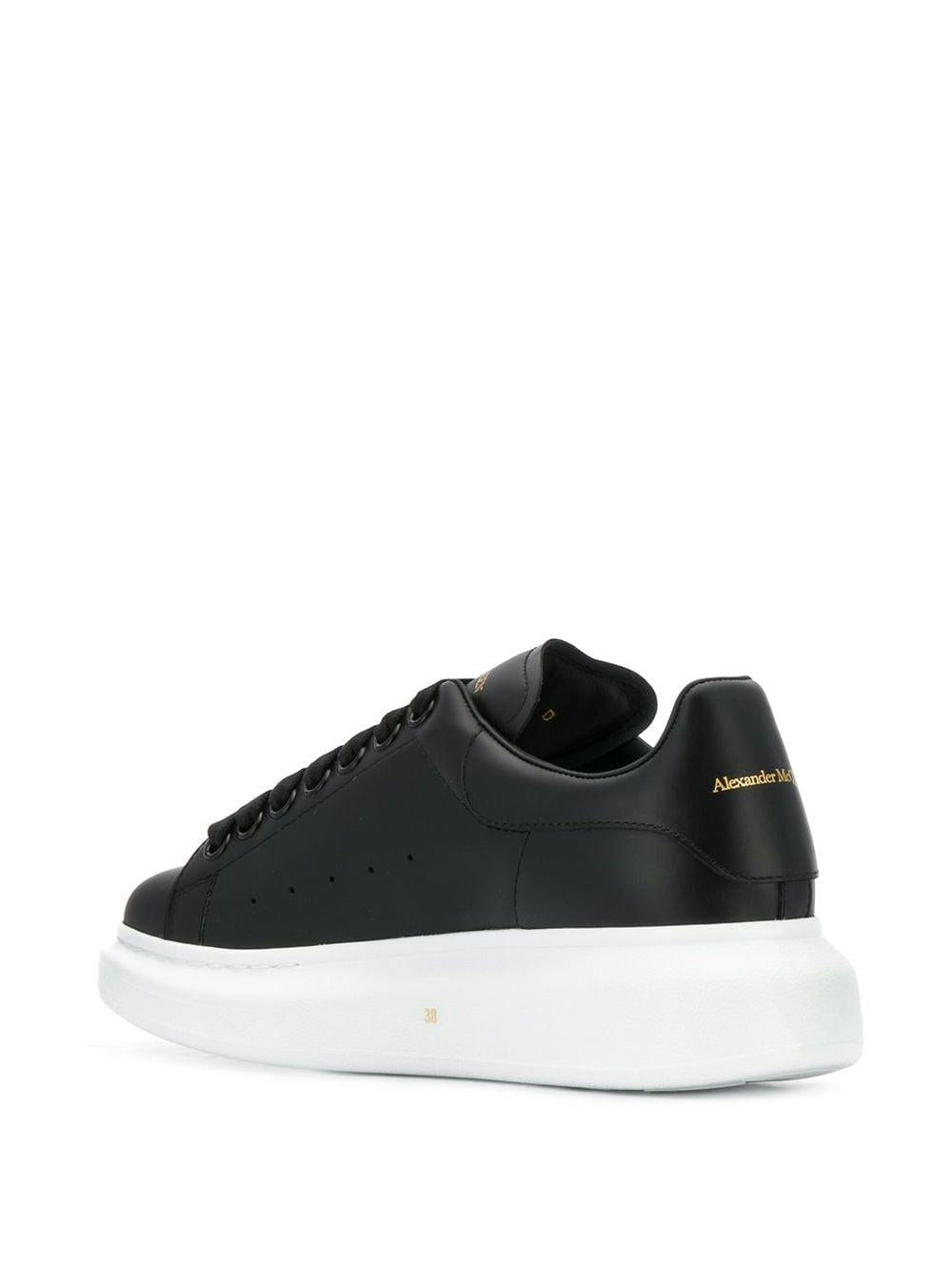 Black/black leather/suede oversized low-top sneakers 553770 WHGP01000 ALEXANDER MCQUEEN 