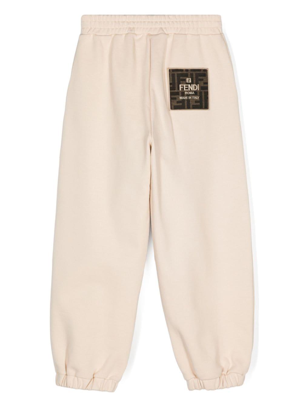 Front logo applique jogger JUF107 5V0F1P2N FENDI KIDS 