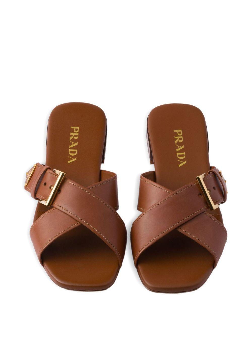 Leather crisscross slides with buckle 1XX778248 F-010F0054 PRADA 