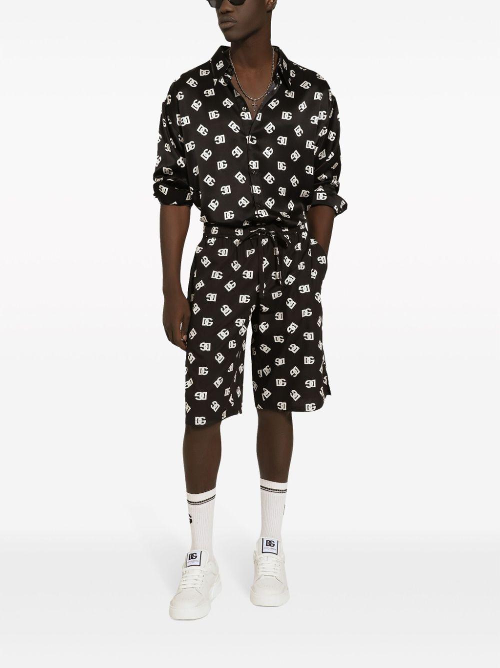 Monogram-print bermuda shorts<BR/><BR/><BR/> GV37AT GH563HNVAA DOLCE & GABBANA 