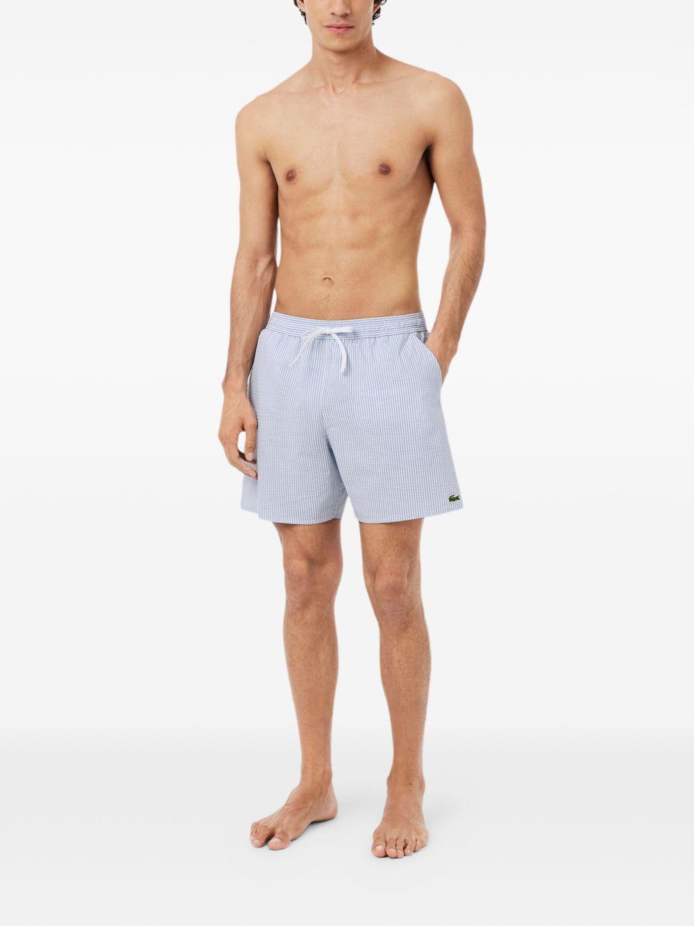 Mid-length striped swim shorts MH9089 7PM LACOSTE 