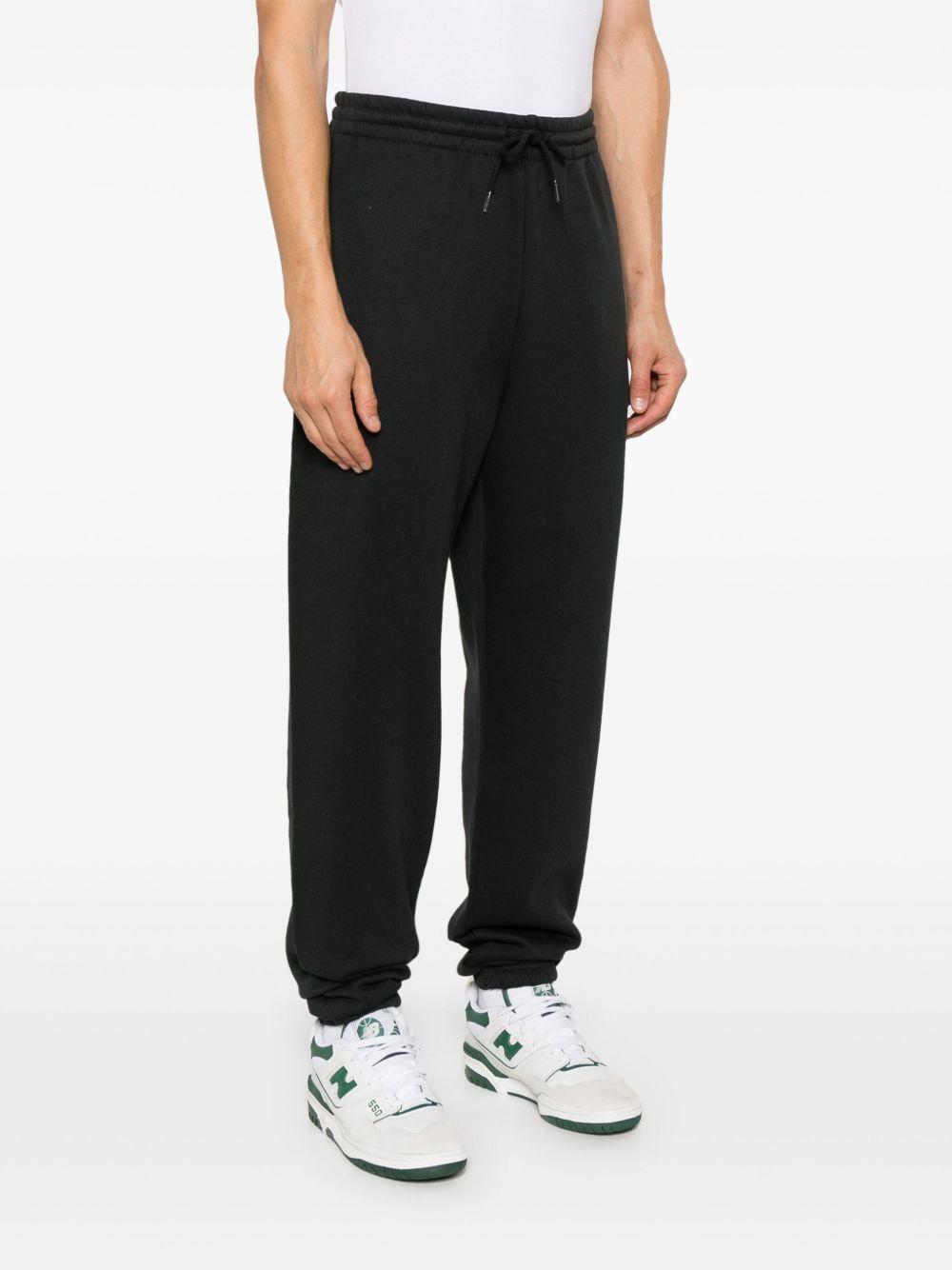 Logo trousers MP41503BK BLACK NEW BALANCE 