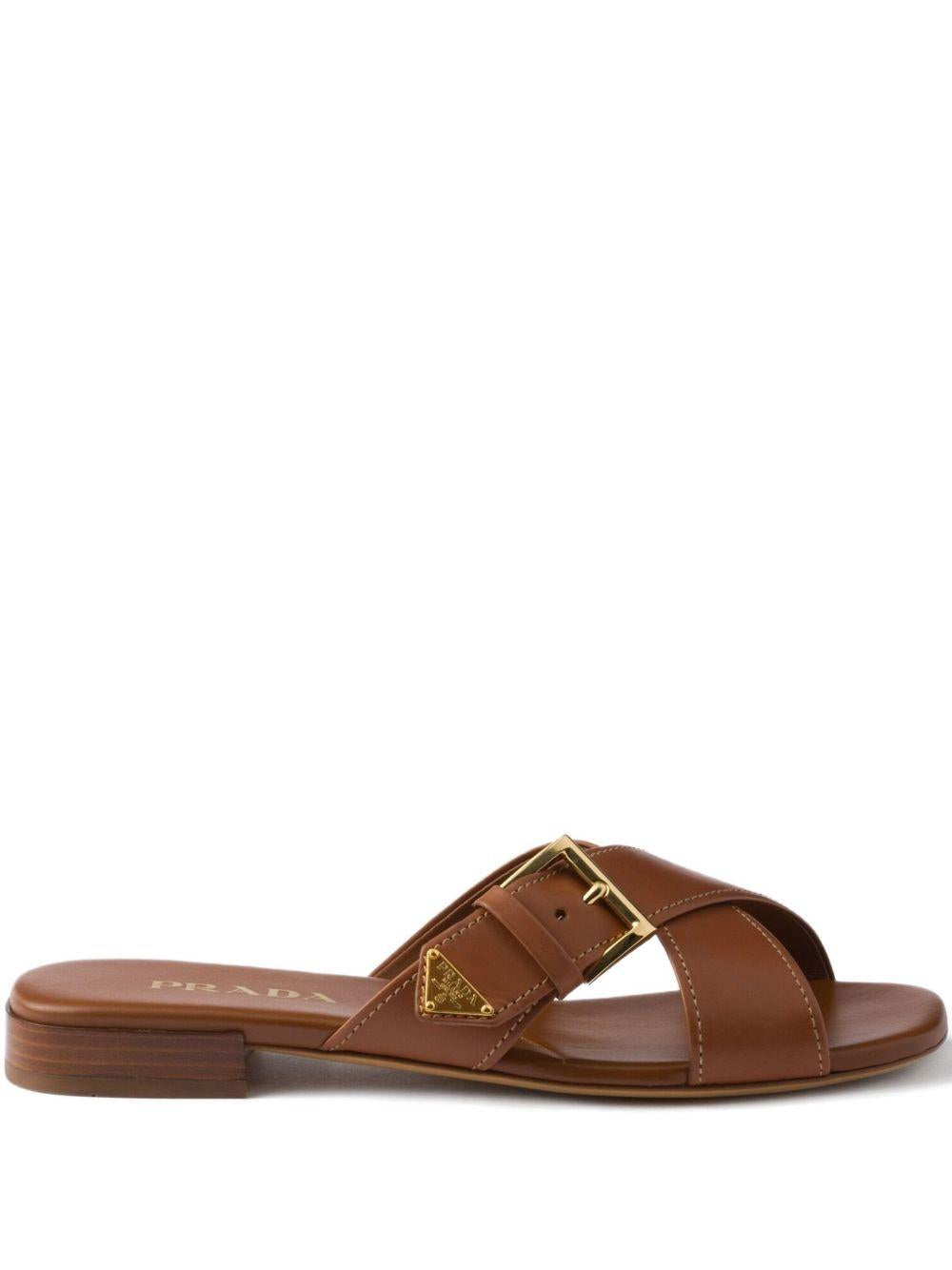 Leather crisscross slides with buckle 1XX778248 F-010F0054 PRADA 
