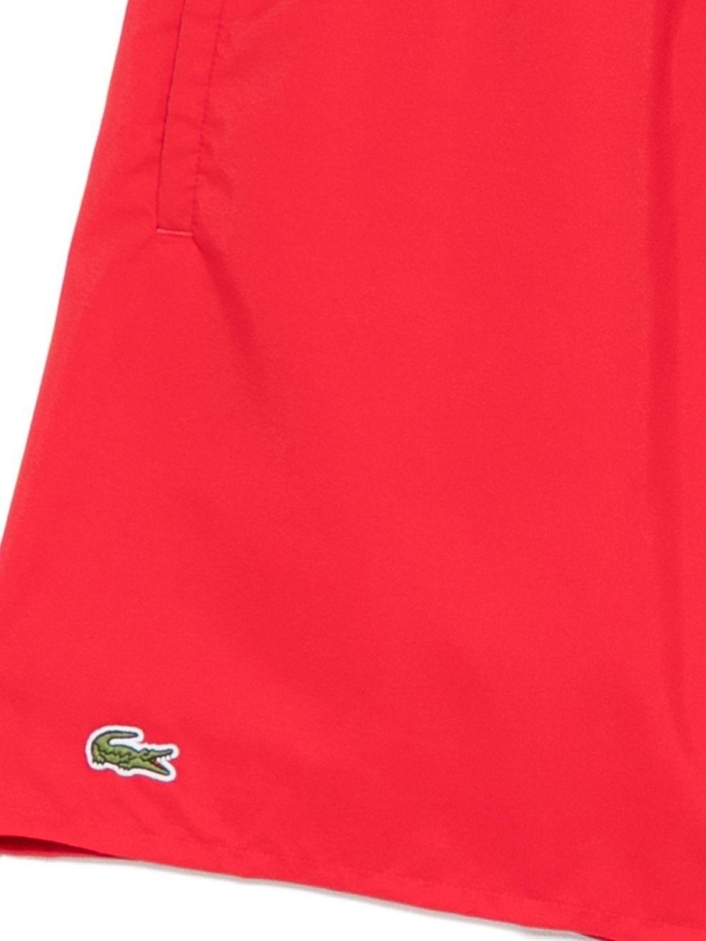 Mid-length monochrome swim shorts MH9088 8UN LACOSTE 