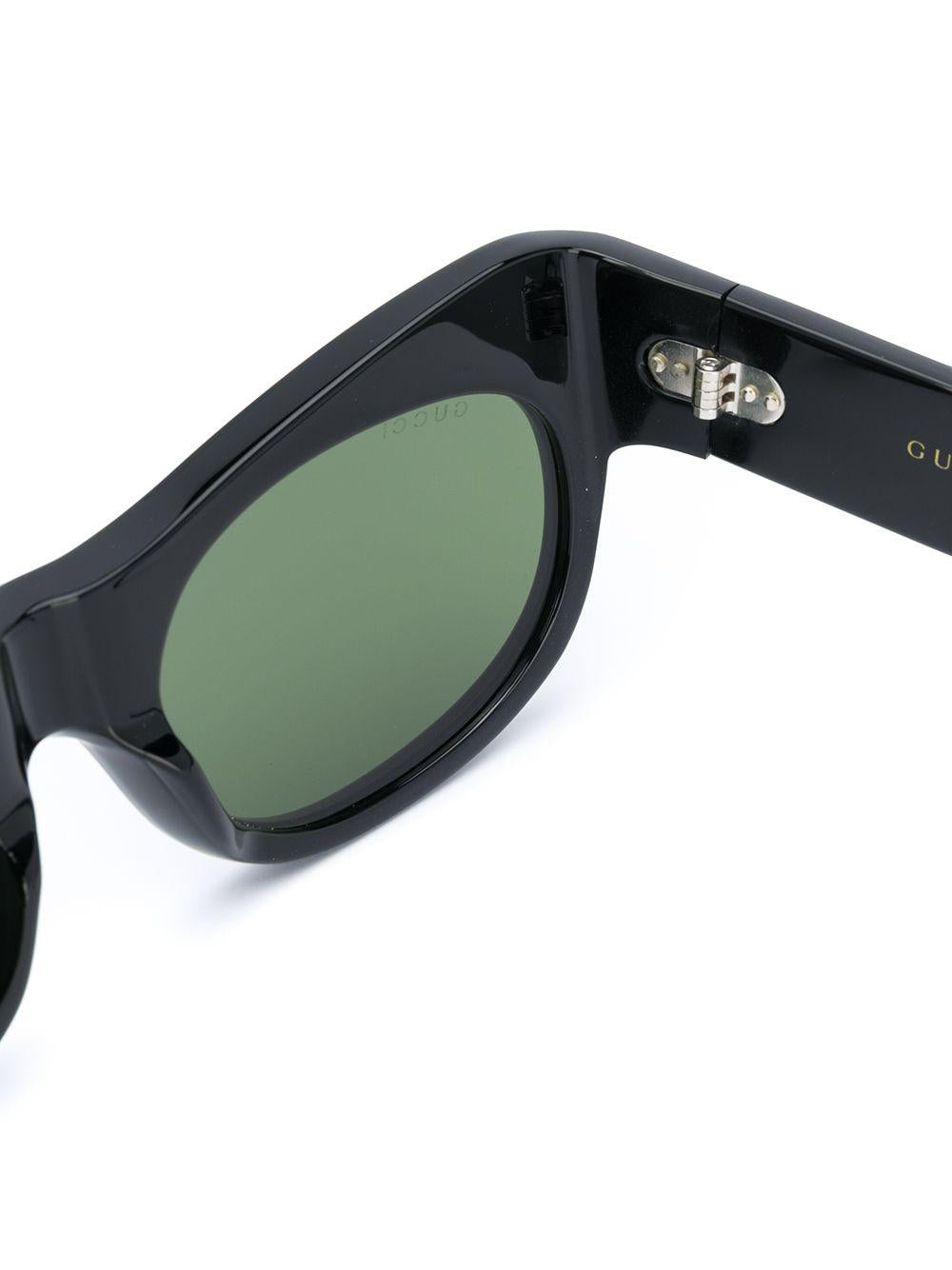 Sunglasses with curved frames 638037 J07401031 GUCCI 