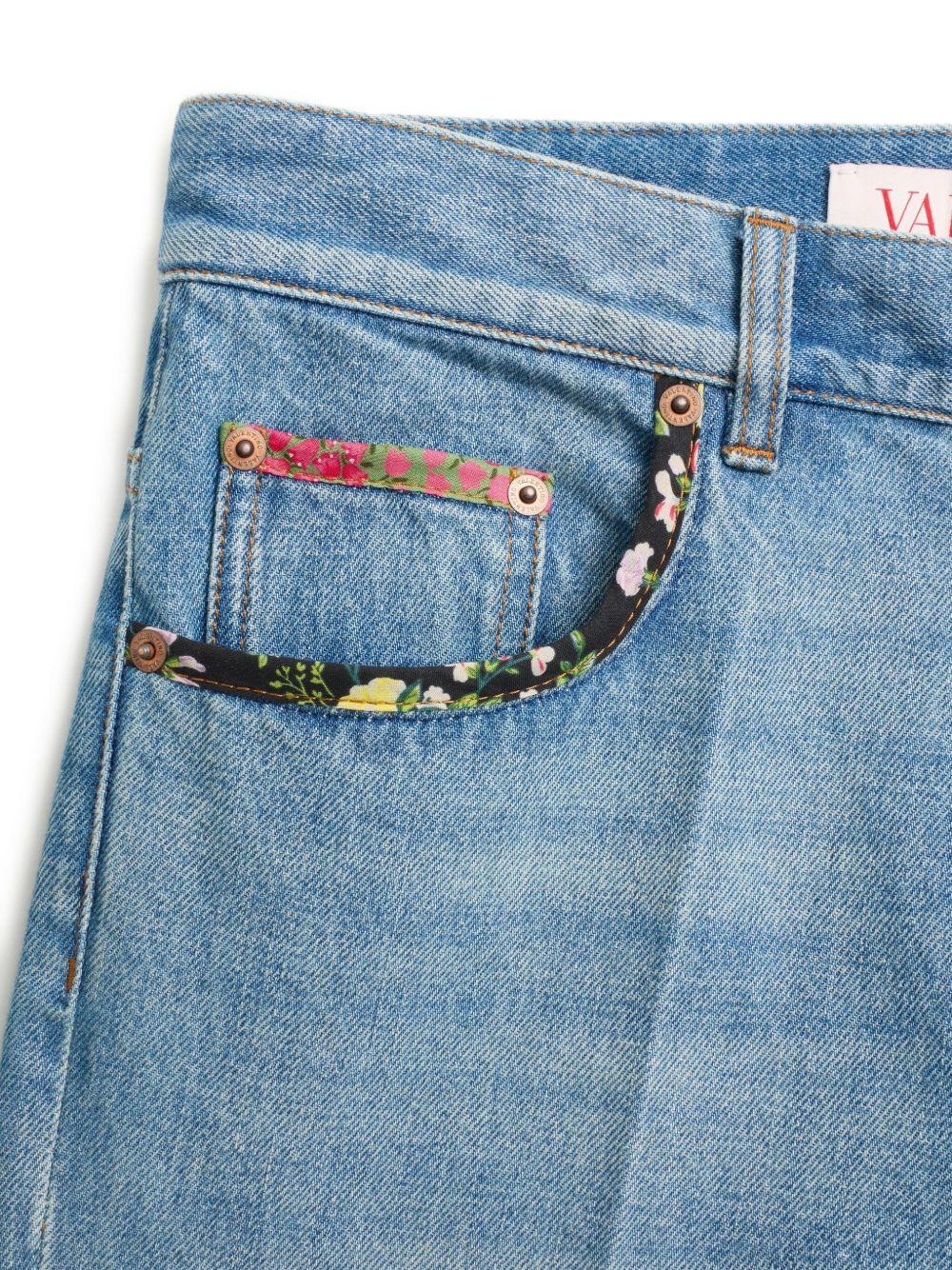 Wide-leg jeans crafted with floral print fabric trim 6B0DD19X94V 558 VALENTINO GARAVANI 