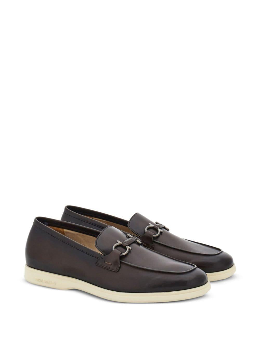 Gancini leather loafers<BR/><BR/> COSIMO 0774494T.MORO FERRAGAMO 