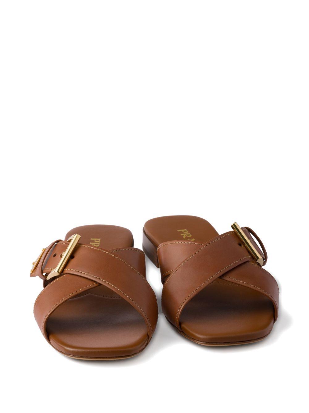 Leather crisscross slides with buckle 1XX778248 F-010F0054 PRADA 