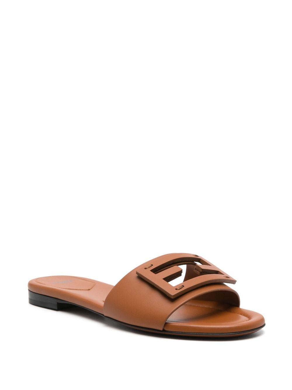 Baguette leather slides 8R8136 AE7TF1C4R FENDI 