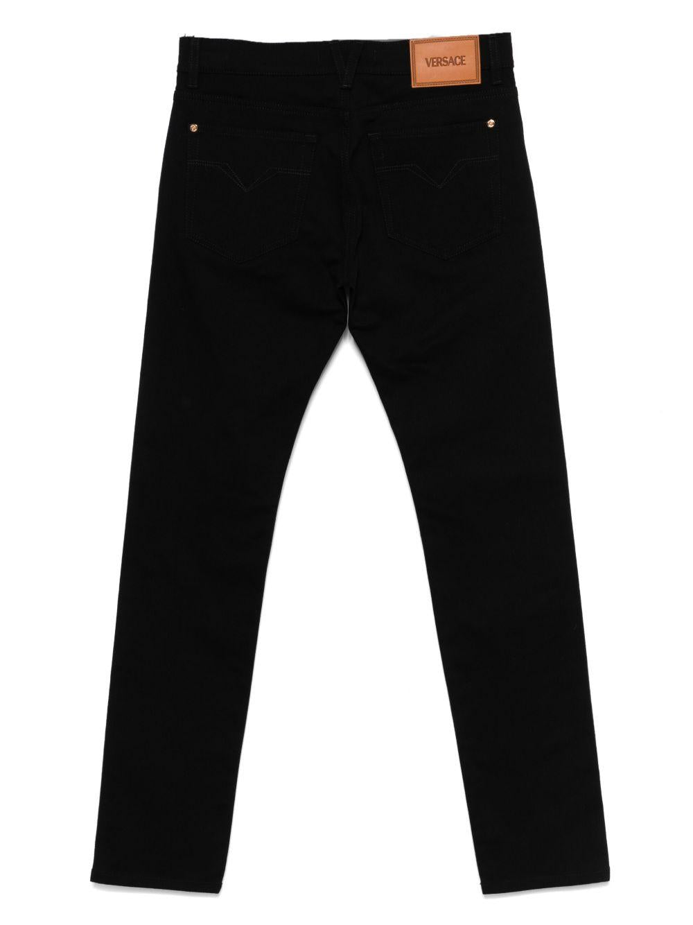 Medusa-plaque jeans<BR/><BR/> 1019050 1A136821D040 VERSACE 