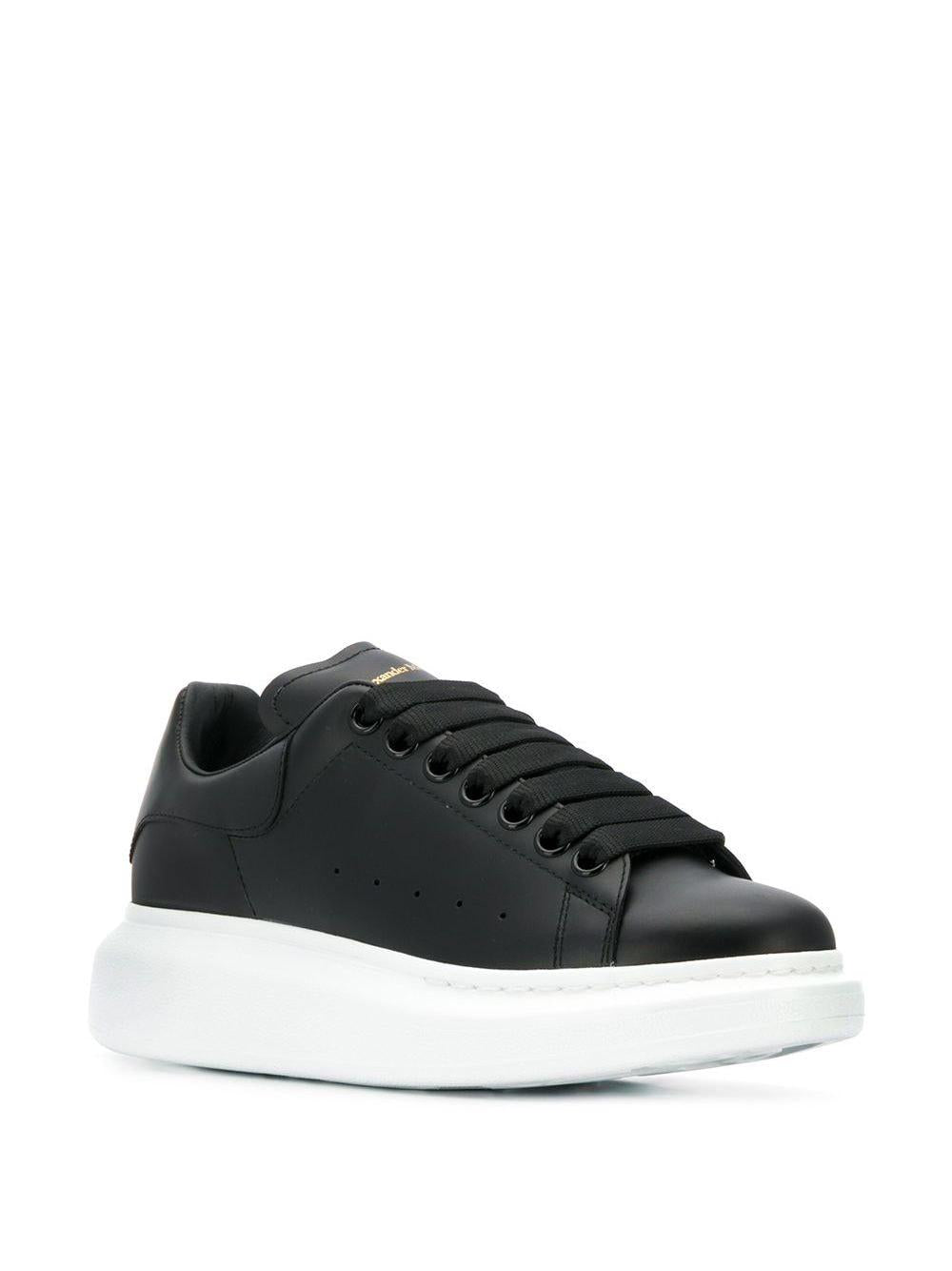 Black/black leather/suede oversized low-top sneakers 553770 WHGP01000 ALEXANDER MCQUEEN 