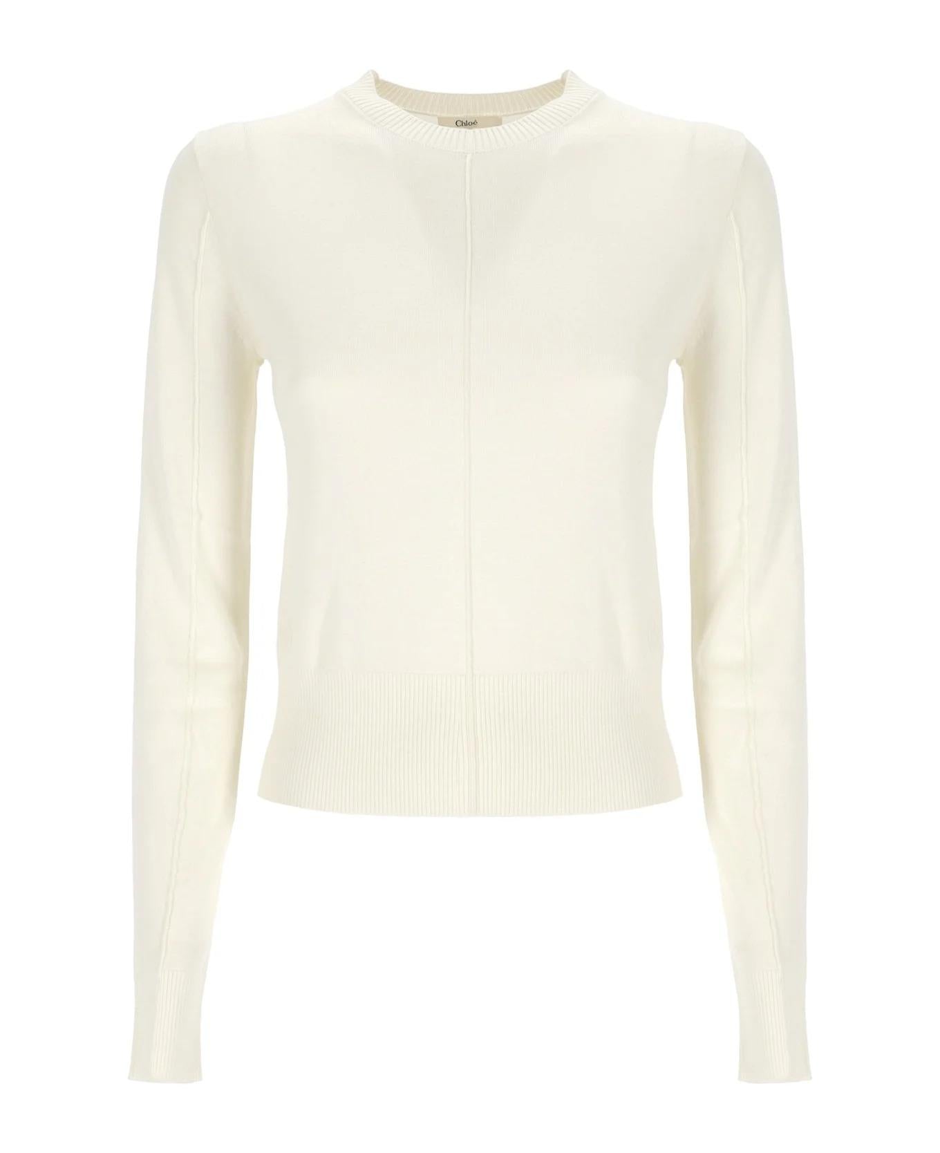 Logo-embroidered roll-neck jumper<BR/><BR/><BR/> CHC24AMP04660 107 CHLOÉ 