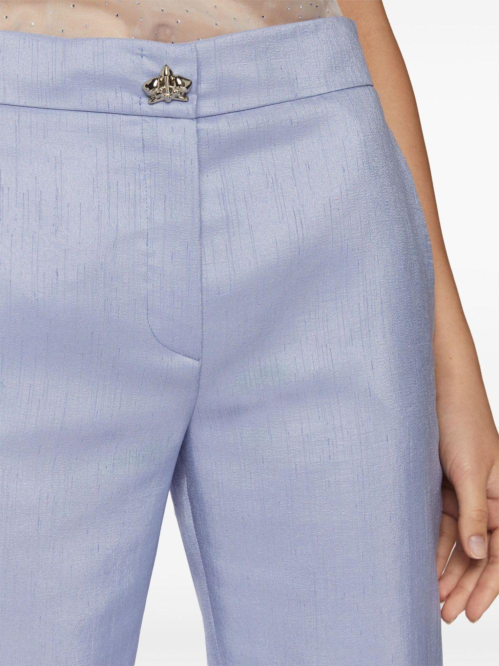 Flared trousers<BR/><BR/><BR/> 78AAA115 N0511247 GENNY 