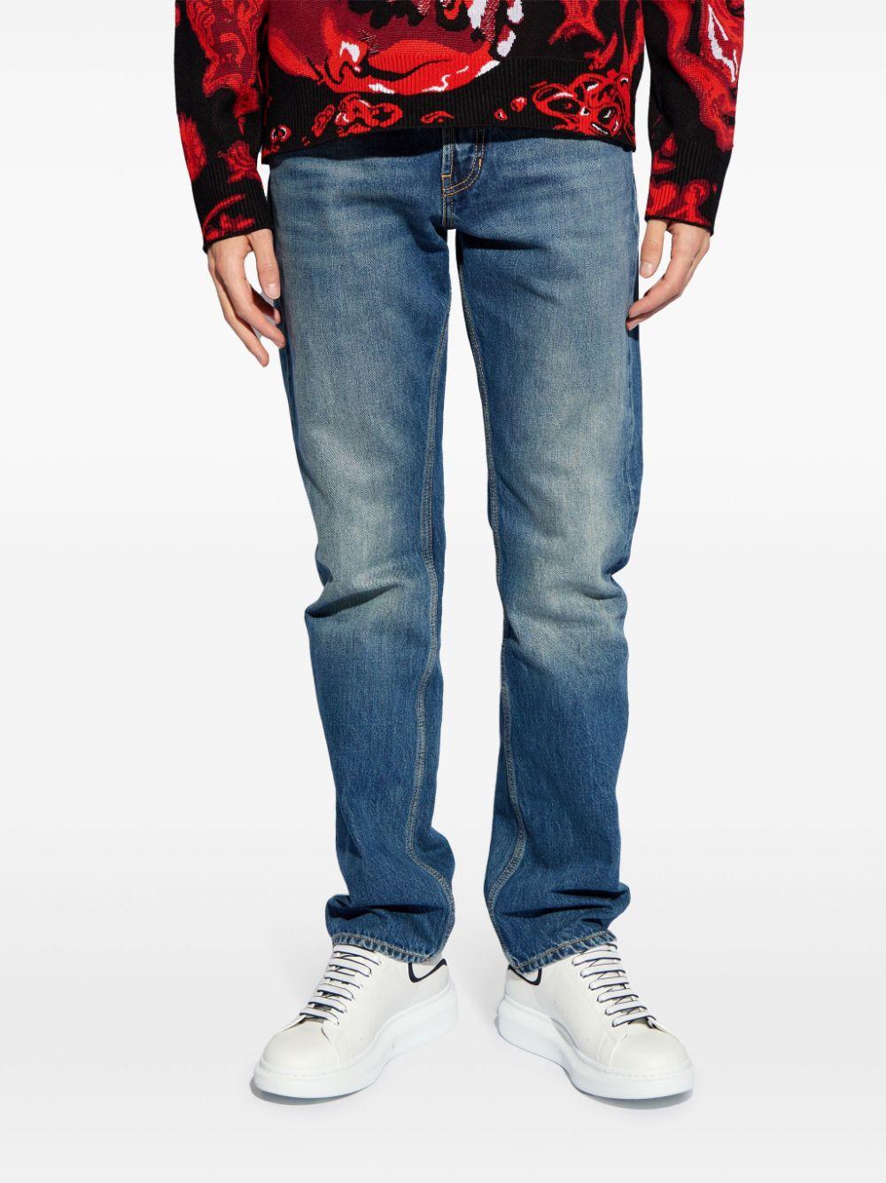 Logo-print straight-leg jeans 794082 QYAA54211 ALEXANDER MCQUEEN 
