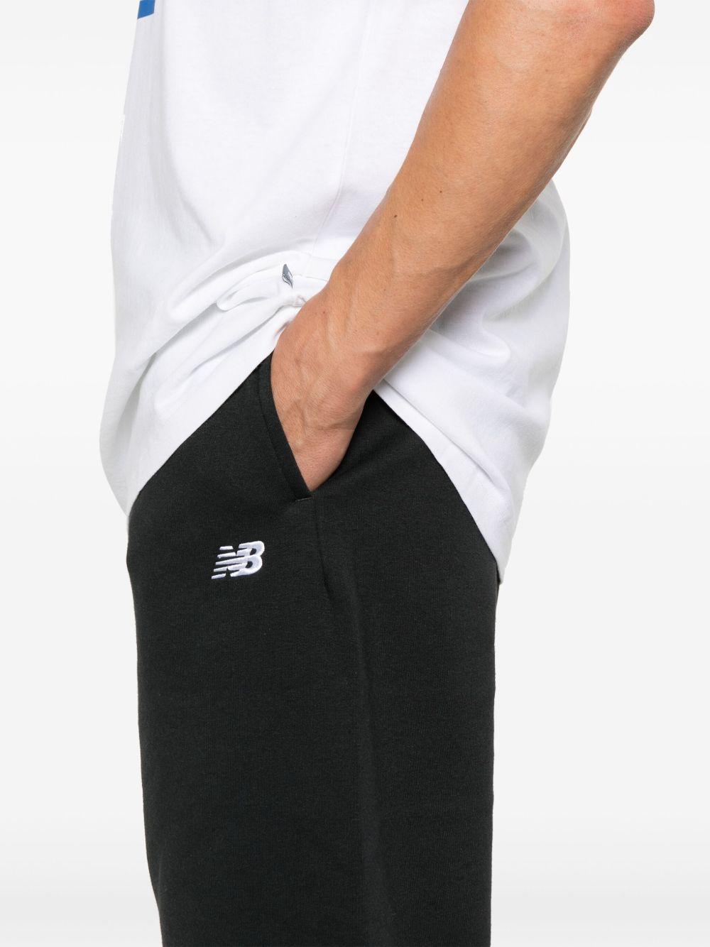 Logo trousers MP41503BK BLACK NEW BALANCE 