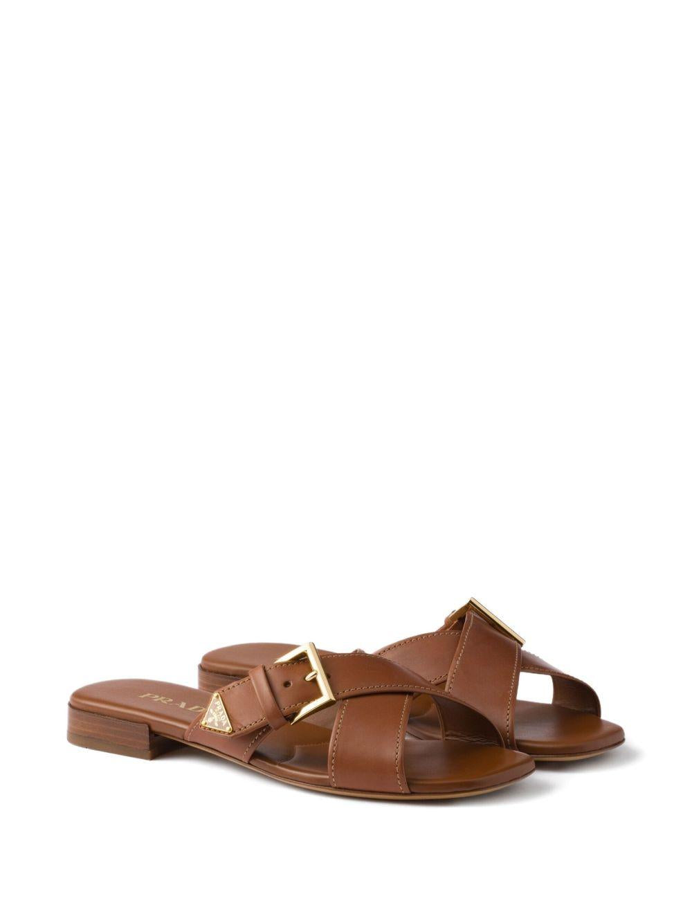 Leather crisscross slides with buckle 1XX778248 F-010F0054 PRADA 