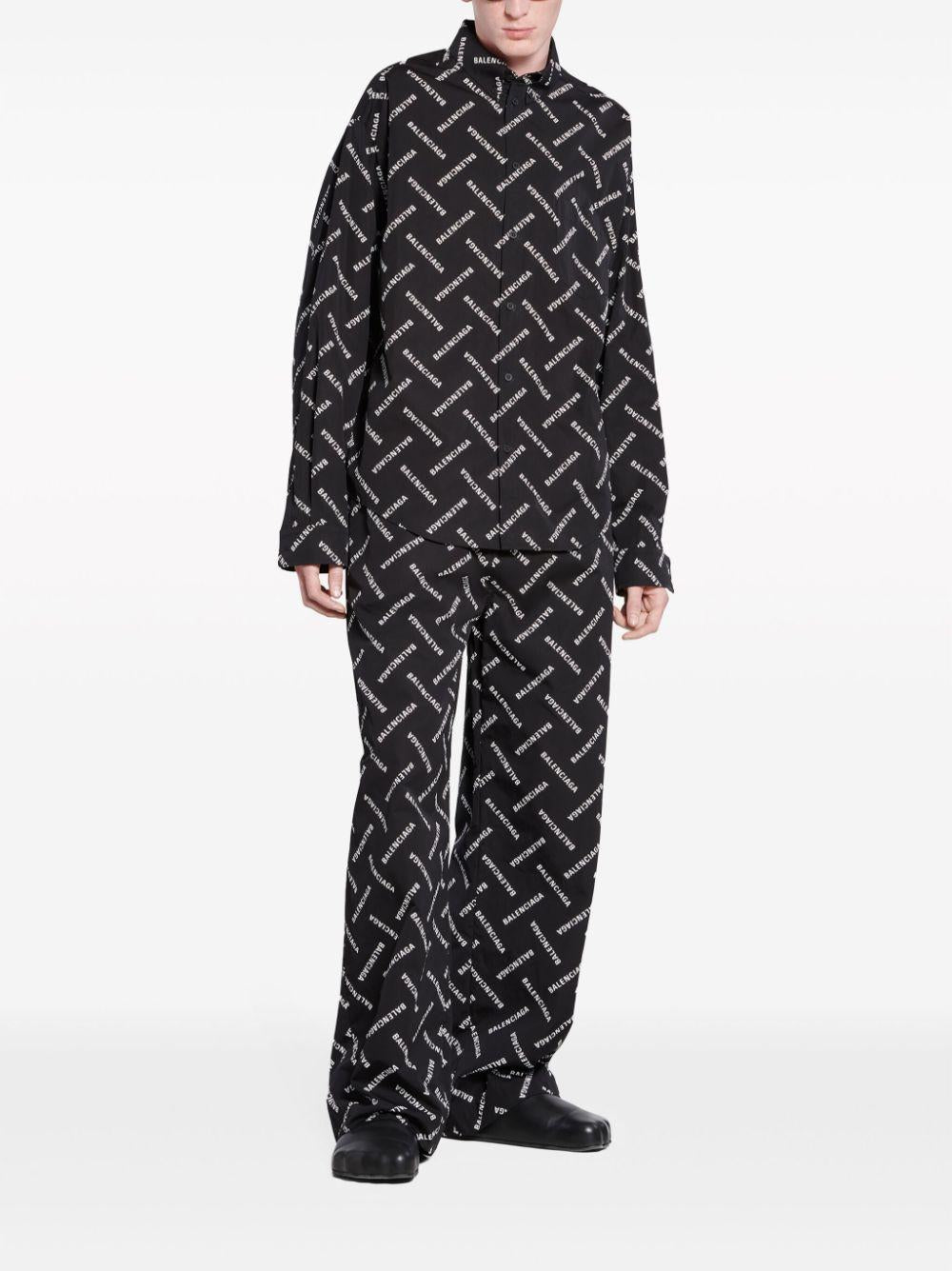 All-over logo-print shirt<BR/><BR/> 662983 TPLA41070 BALENCIAGA 