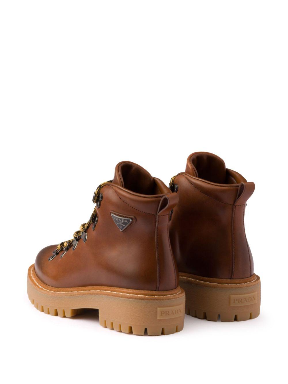 Laced leather ankle boots<BR/><BR/><BR/> 1T735N 070F0046 PRADA 